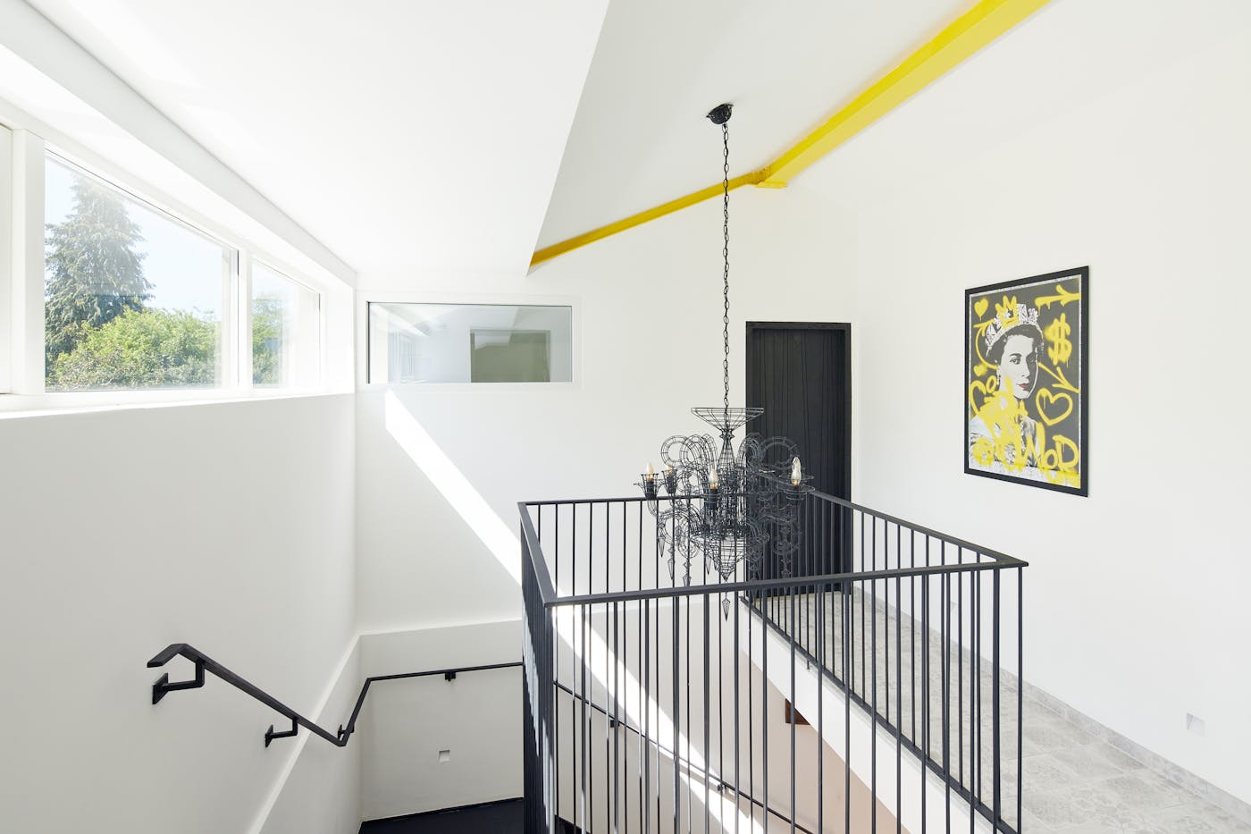 And those splashes of colour are dotted throughout with this yellow beam adding unique design interest to the new 2nd floor 