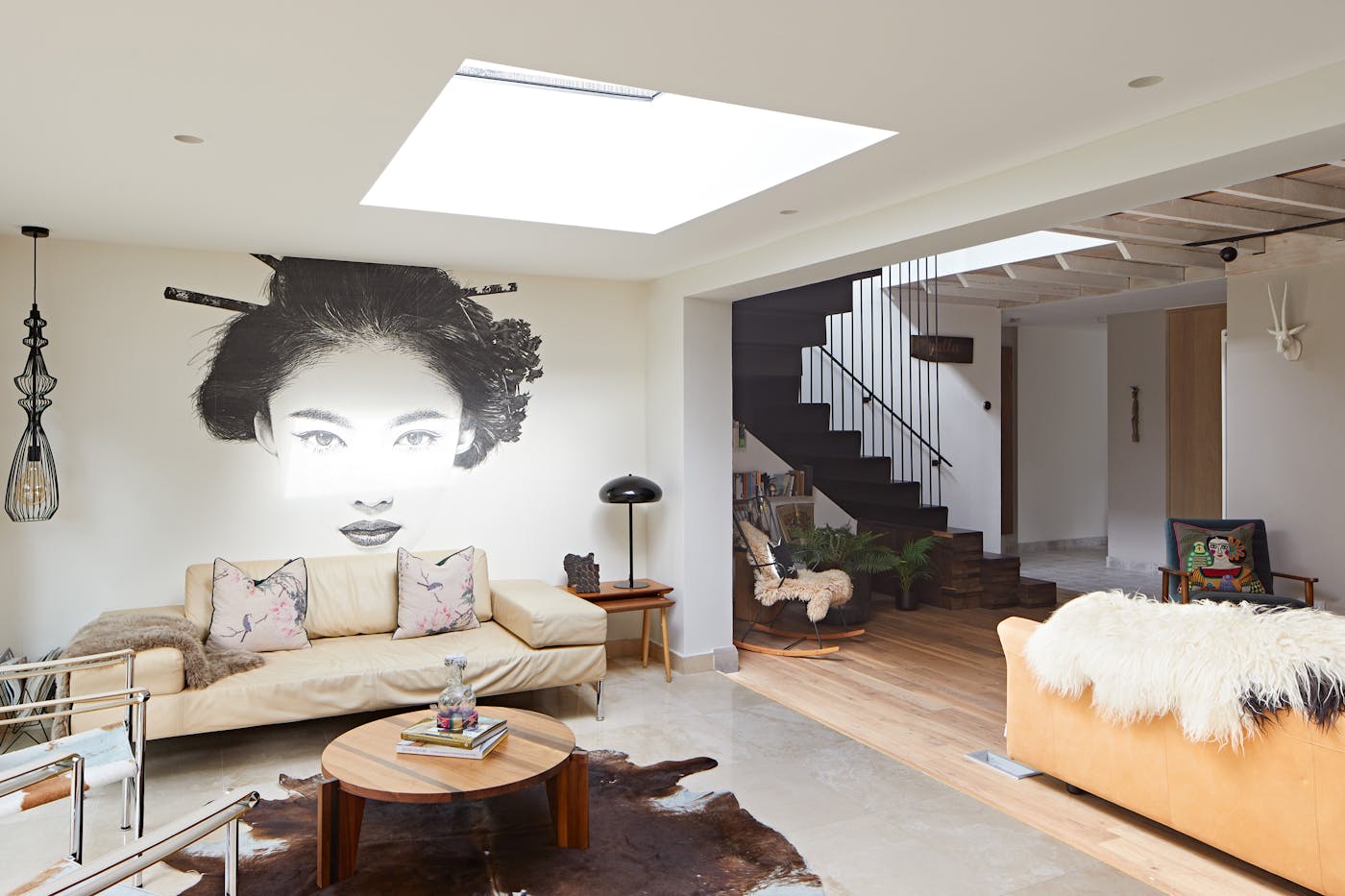 Earthy tones & multiple textures make this living space inviting and interesting