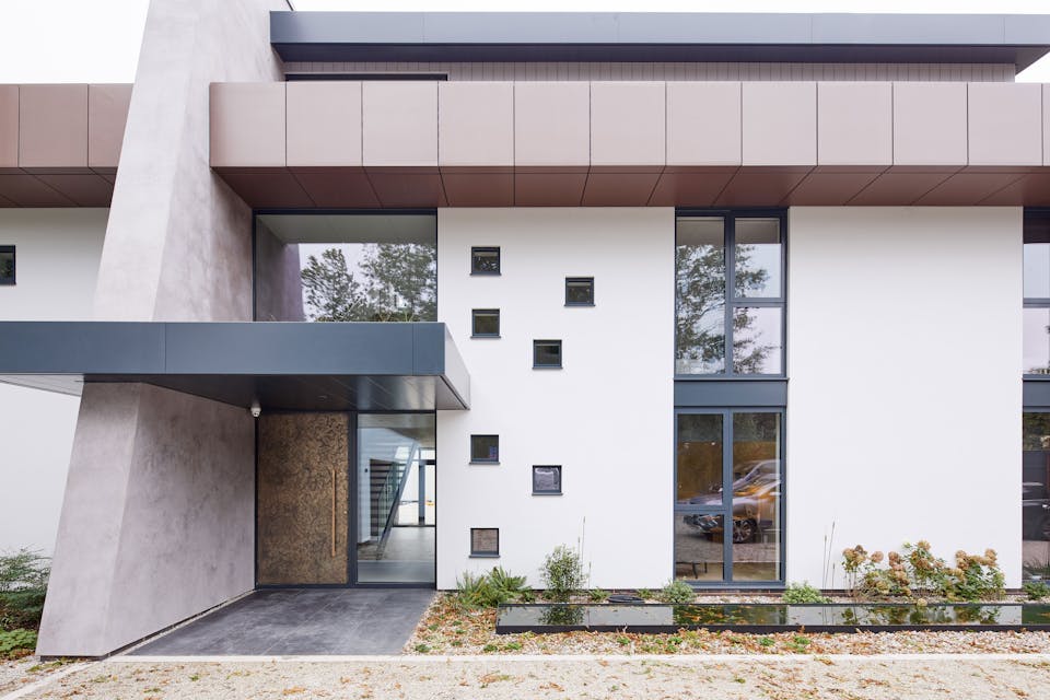 Bronze door exterior facade | Urban Front