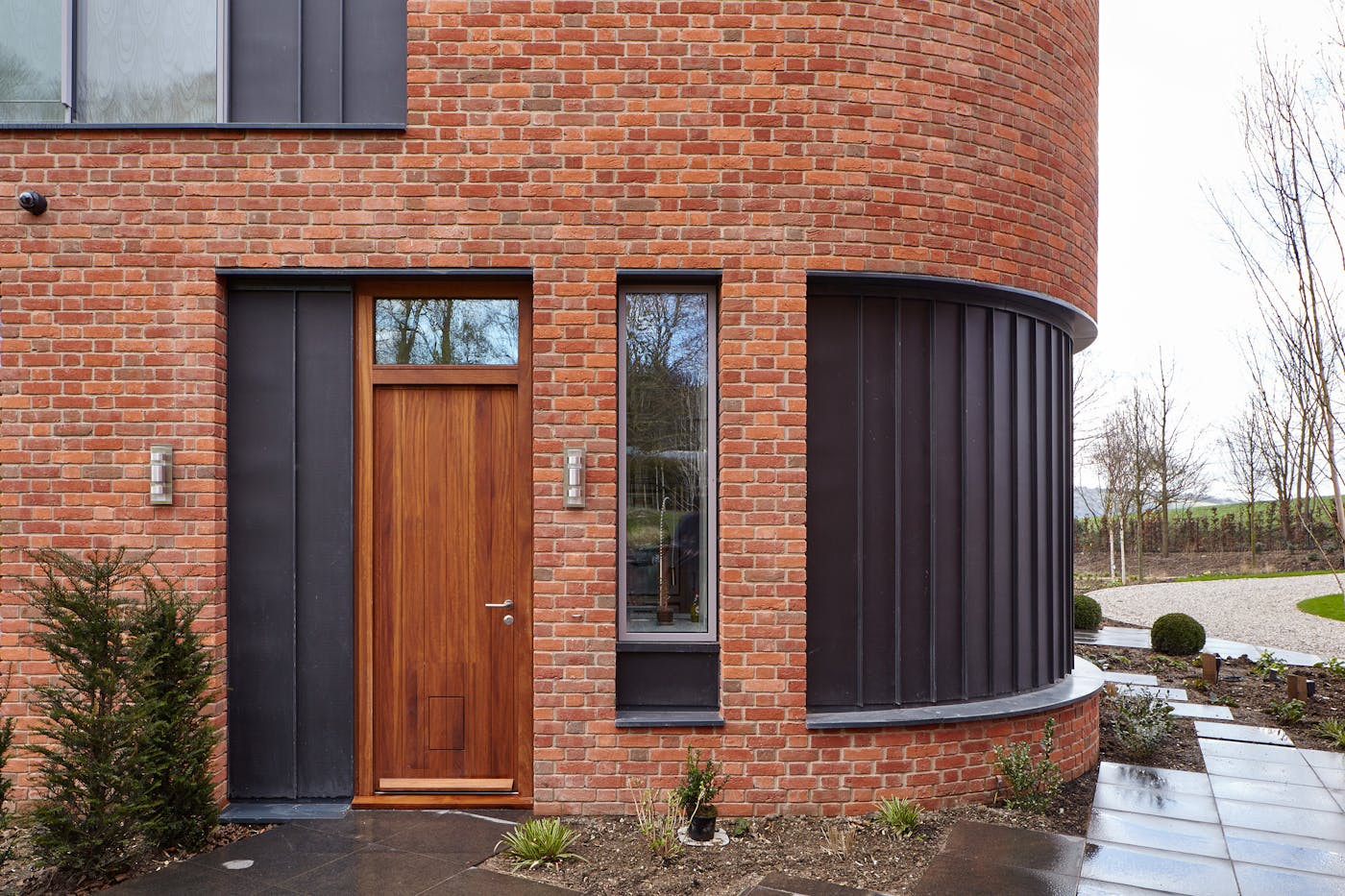Our Porto front door design in iroko is used across the property