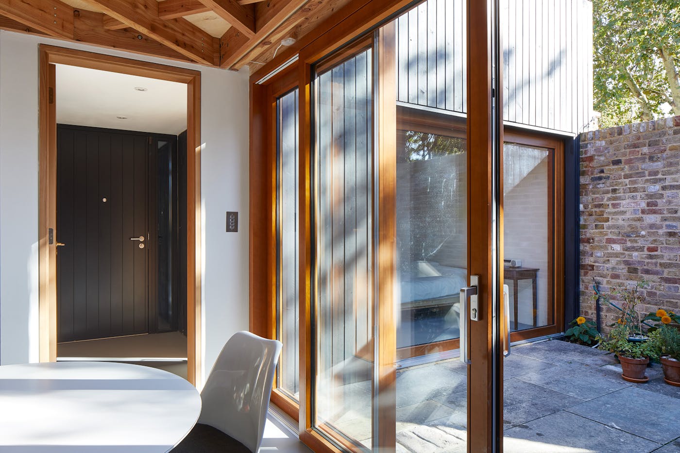 Courtyard and living area view of the front door