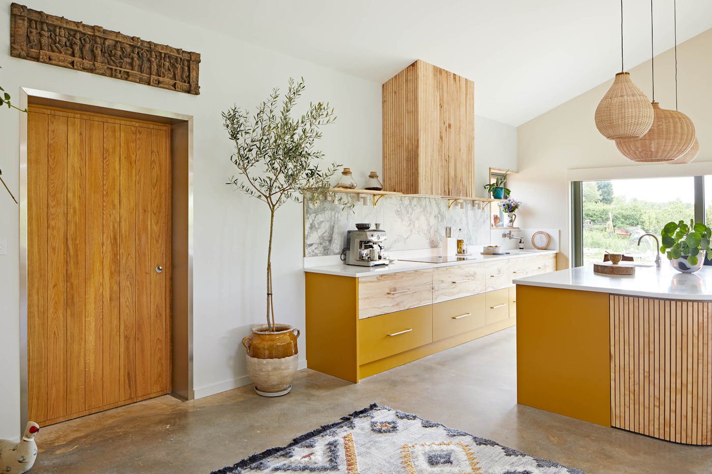 Internally, the door complements the stunning, handcrafted bespoke kitchen