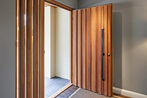 ridge e98flush hinged in iroko with option11a and matching black glass side panel