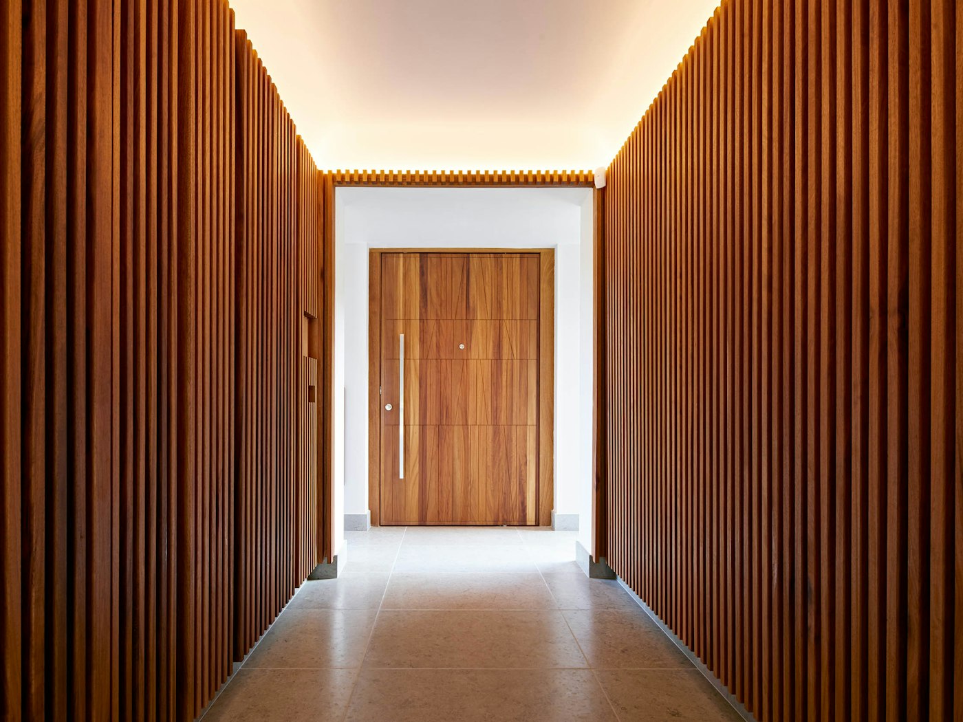 This homeowner chose to match the door to the internal cladding - what an entrance!