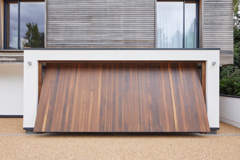 Up and over garage door in fumed oak