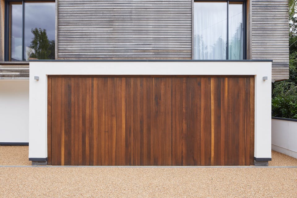 Up and over garage door in fumed oak