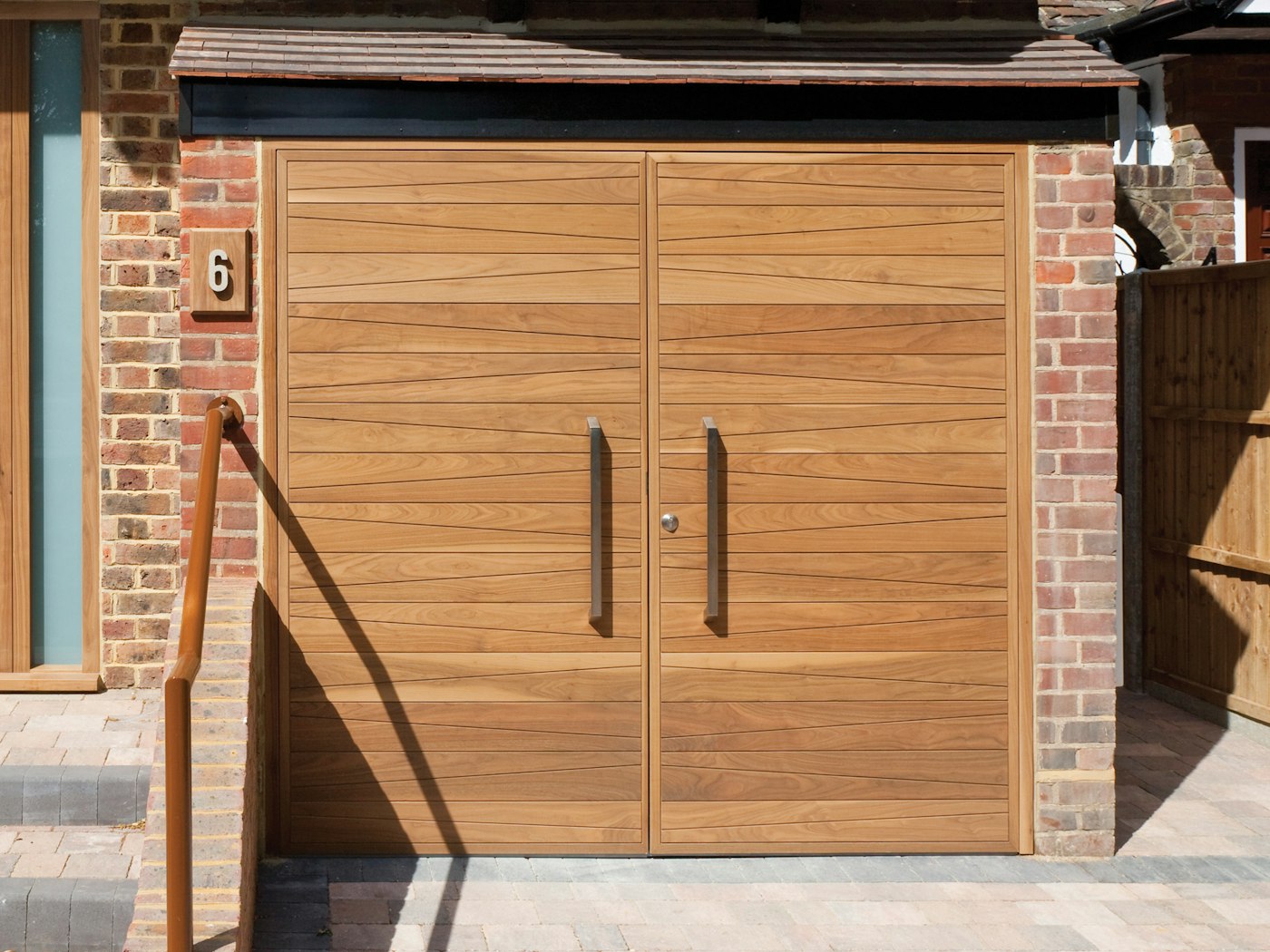 Side hinged garage doors | Milano design | American black walnut