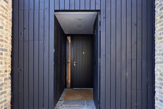 Black front door open | Urban Front