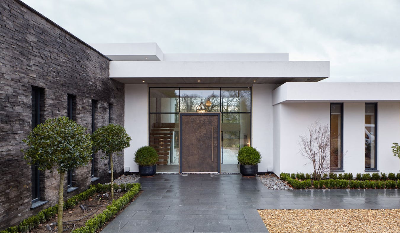 We handcraft exclusive doors in a range of designer materials & finishes (shown here, our luxury textured bronze door, ref:101)