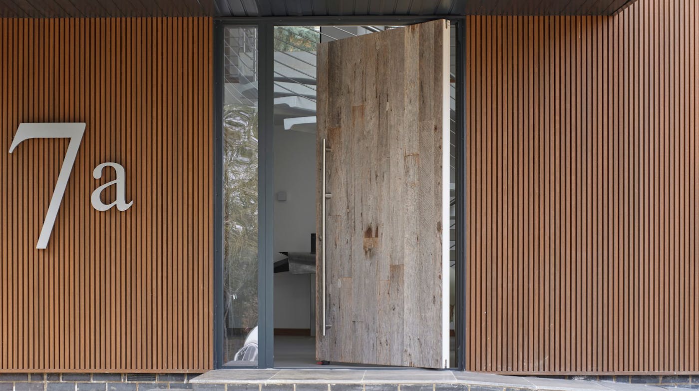 Pivot door in reclaimed barn wood and option 18 handle