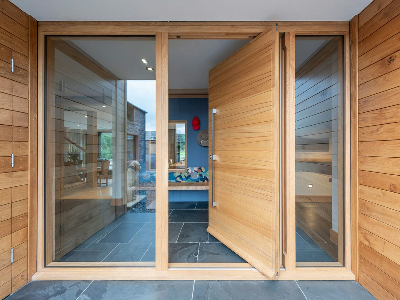 Oak pivot door | Open | Urban Front