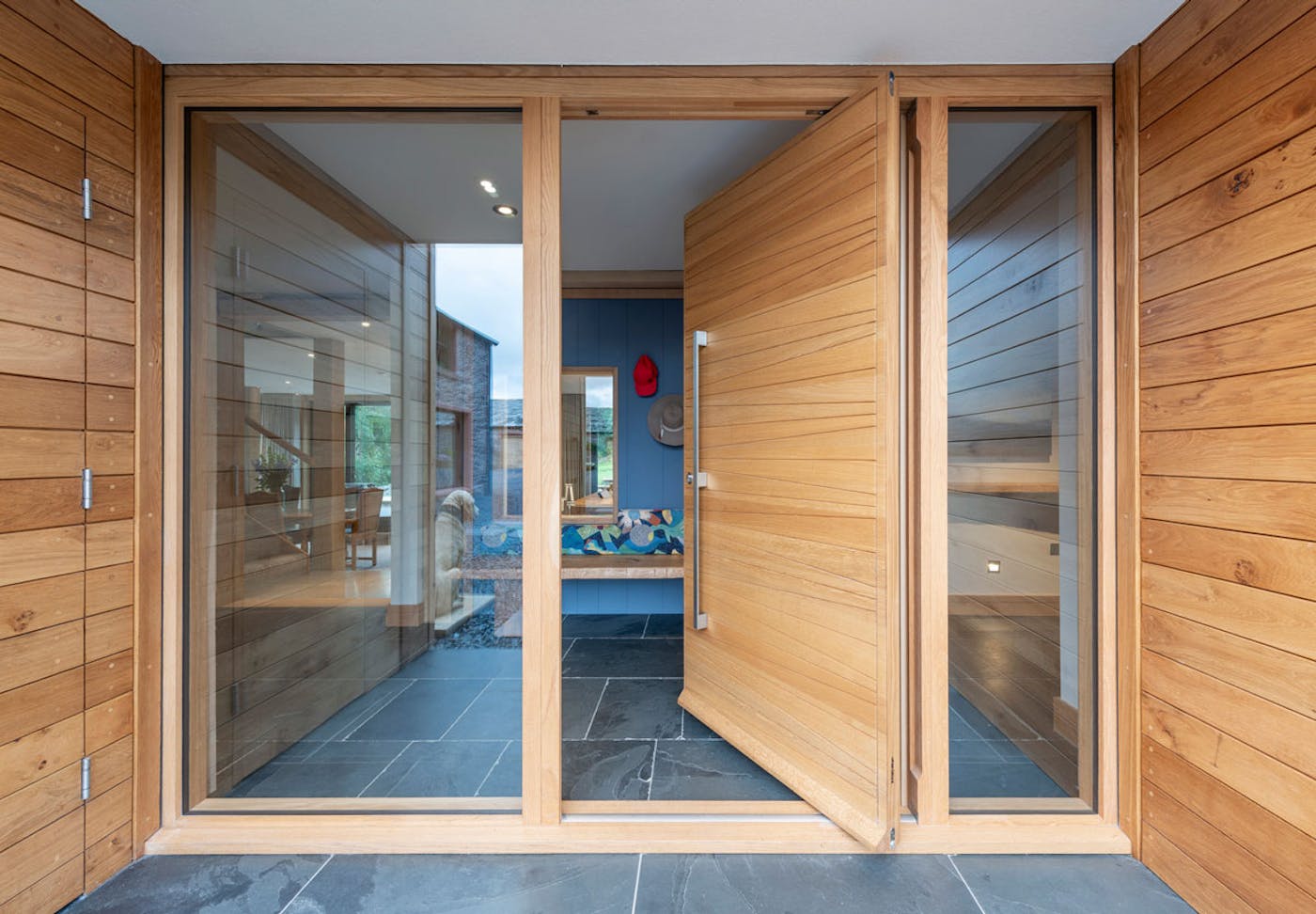 Oak pivot door | Open | Urban Front