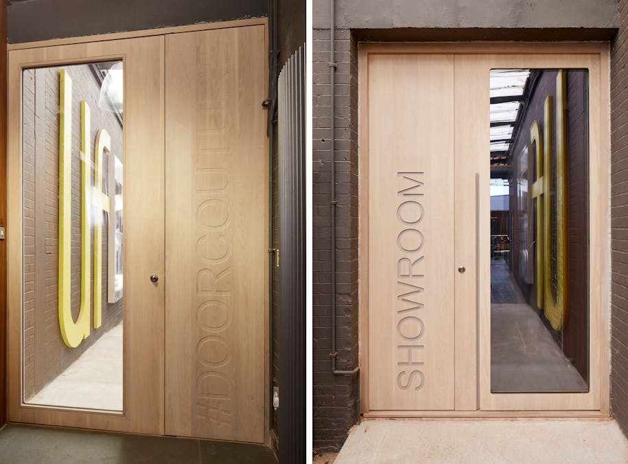 The Urban Front showroom door is a bespoke version of the "Ice" design (created in whitewashed oak with a corian inlay)