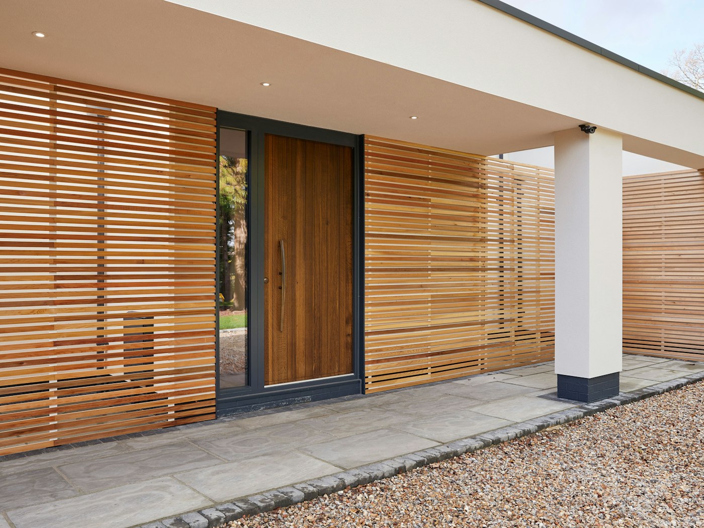 In fumed oak, this Rondo V is offset by off-white render and light oak cladding