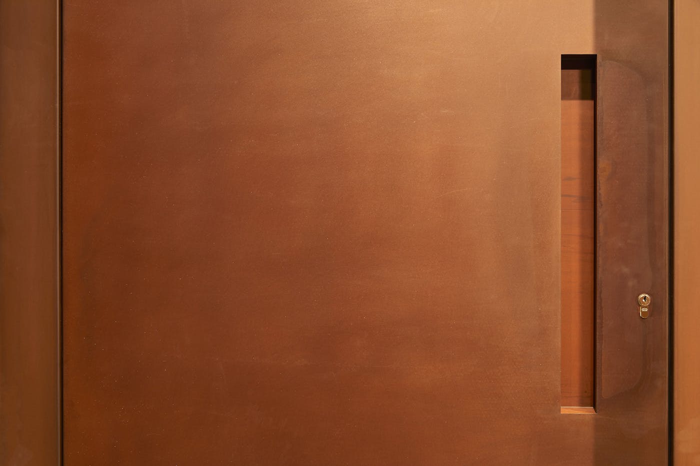"Raw" corten steel door (rust) with concealed handle