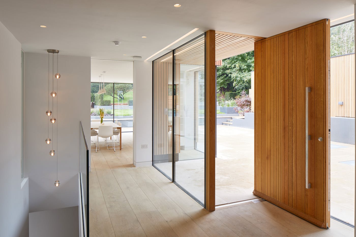 Fitted in glass, this door makes an impressive entrance