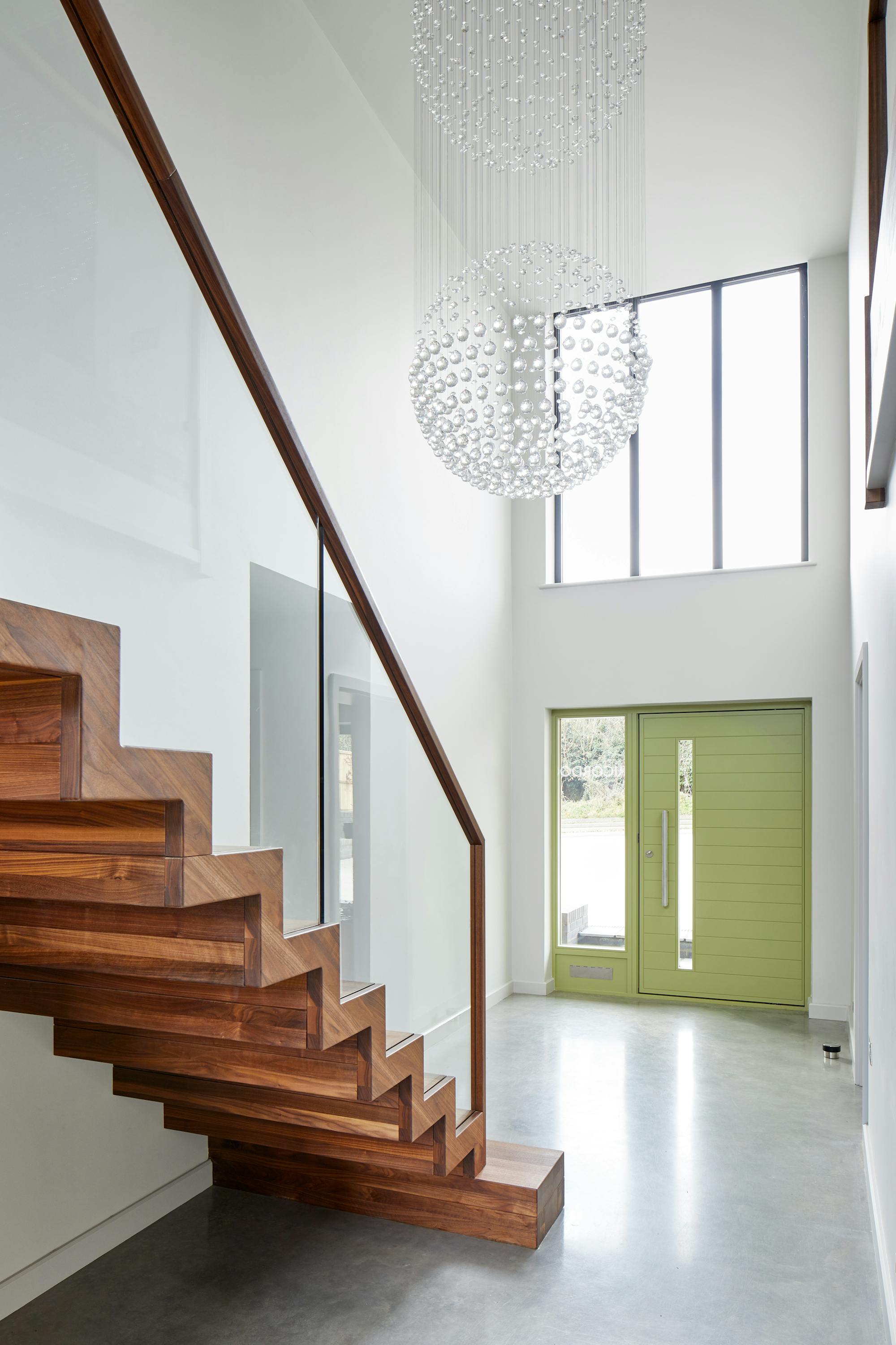 Green terano door with sidelite and panel